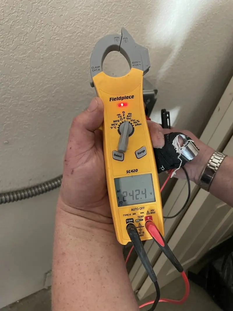 Voltage testing with clamp meter during Generator Installation in Santaquin